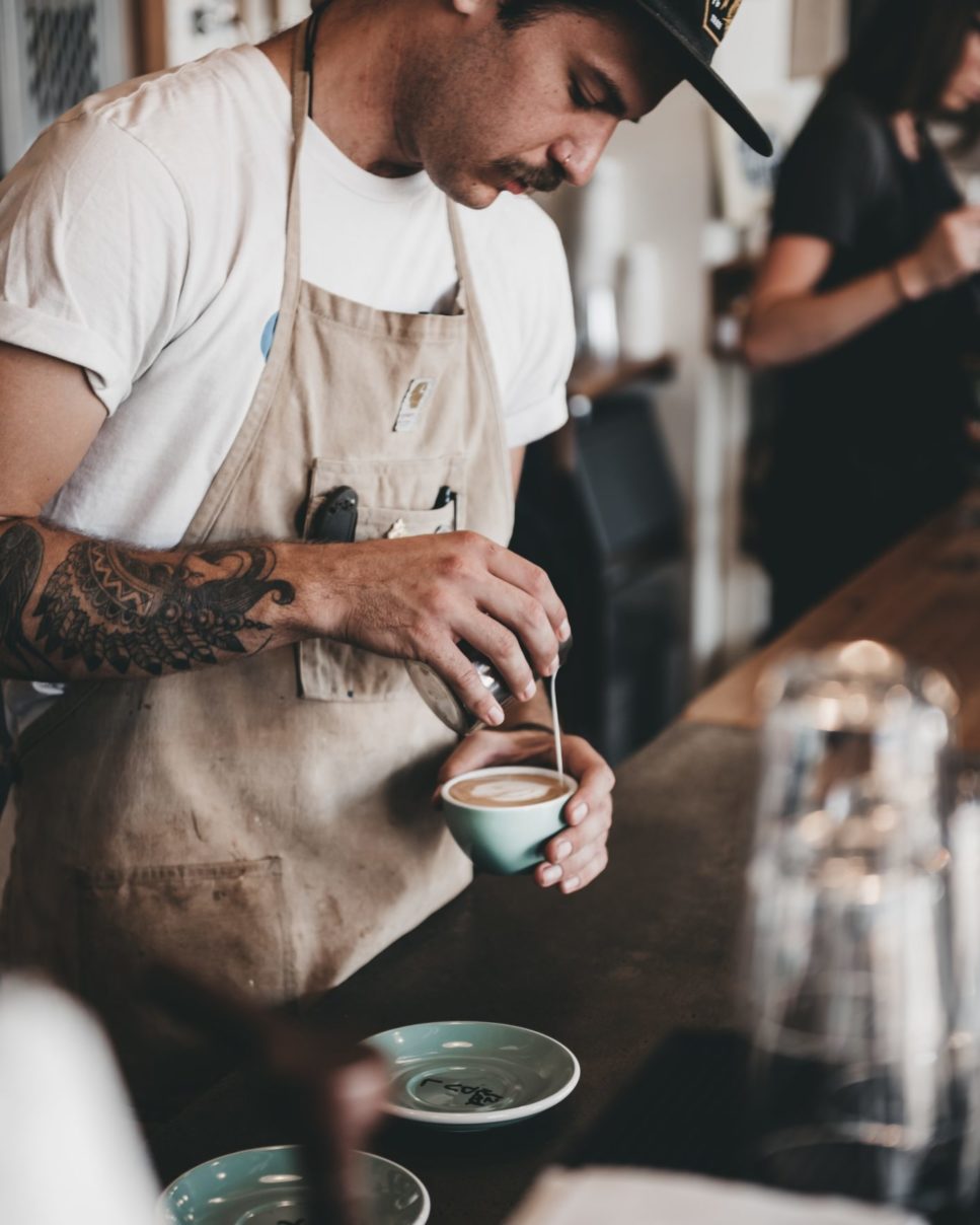 barista pouring coffee online coaching