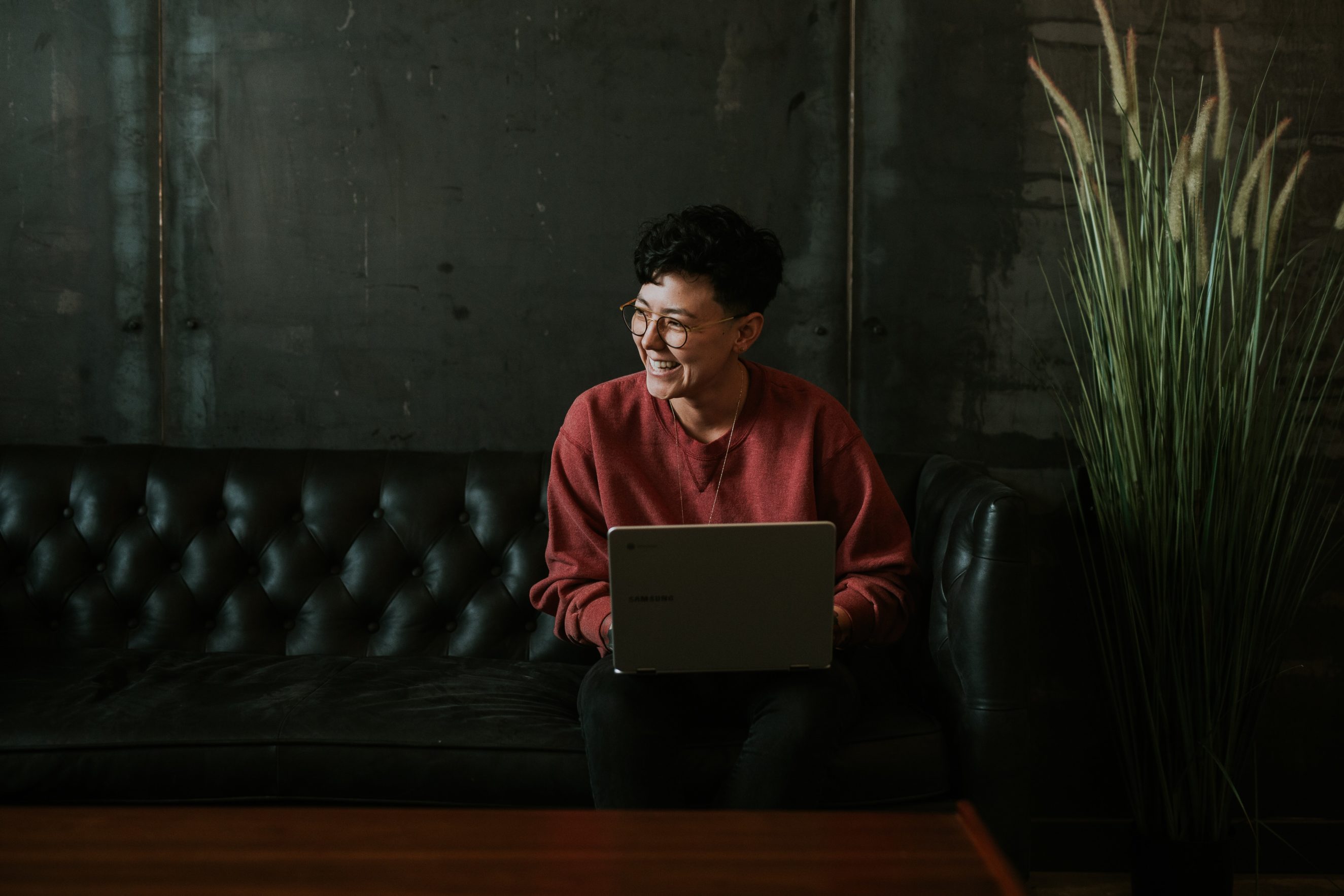 woman sitting on couch