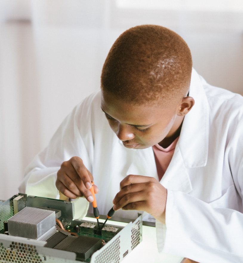 person working on circuit board