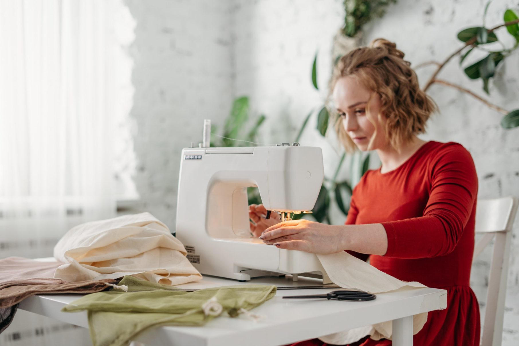 woman sewing at machine