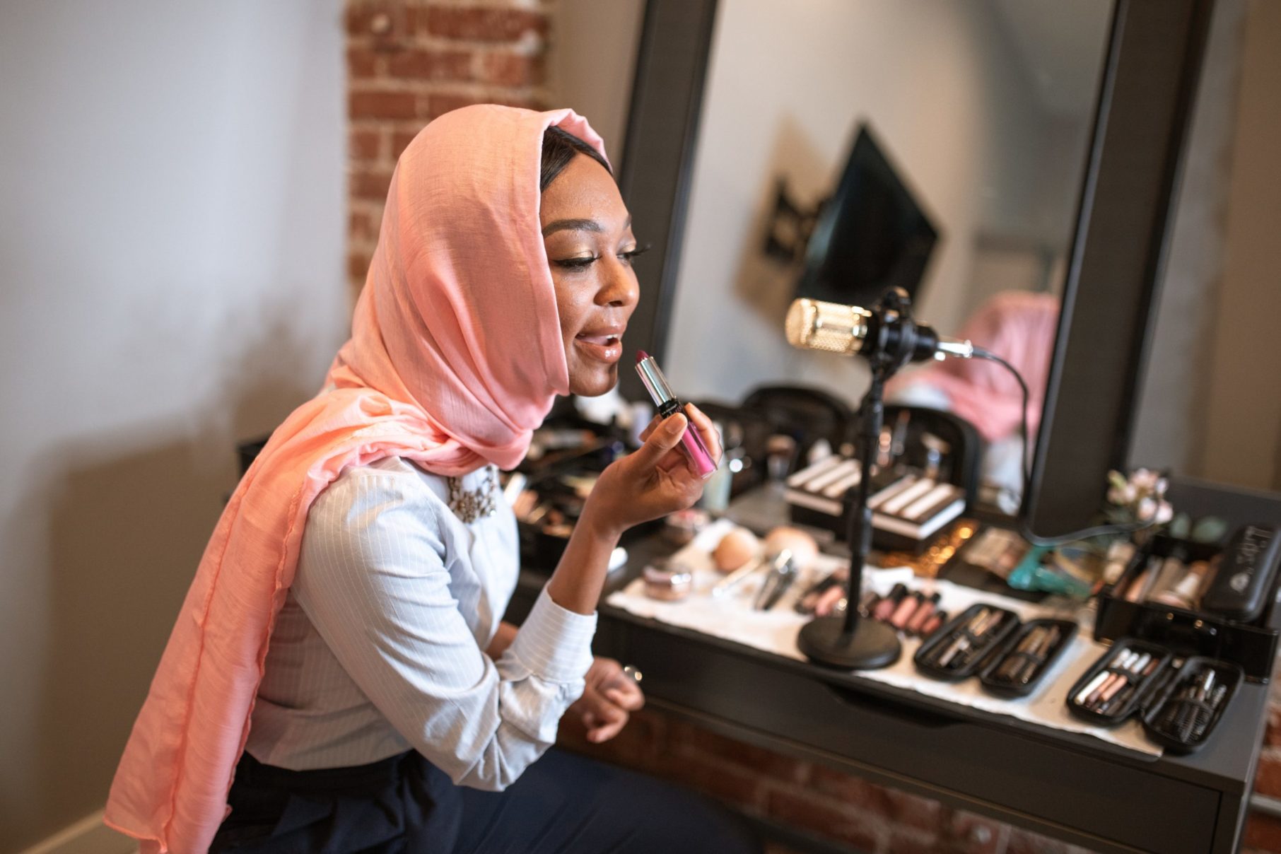 Woman doing makeup tutorial