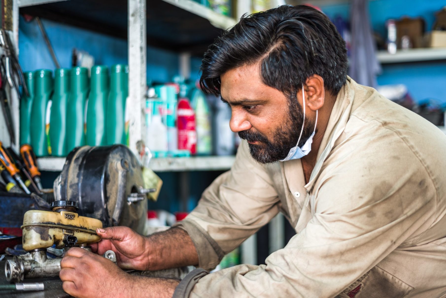 man working on mechanical parts