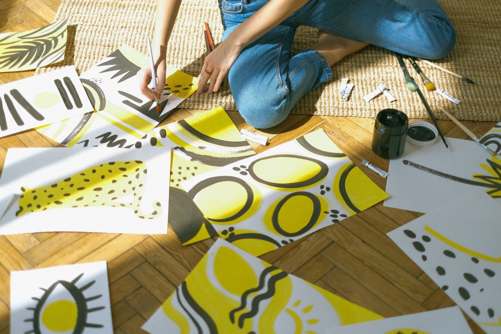 person painting on floor