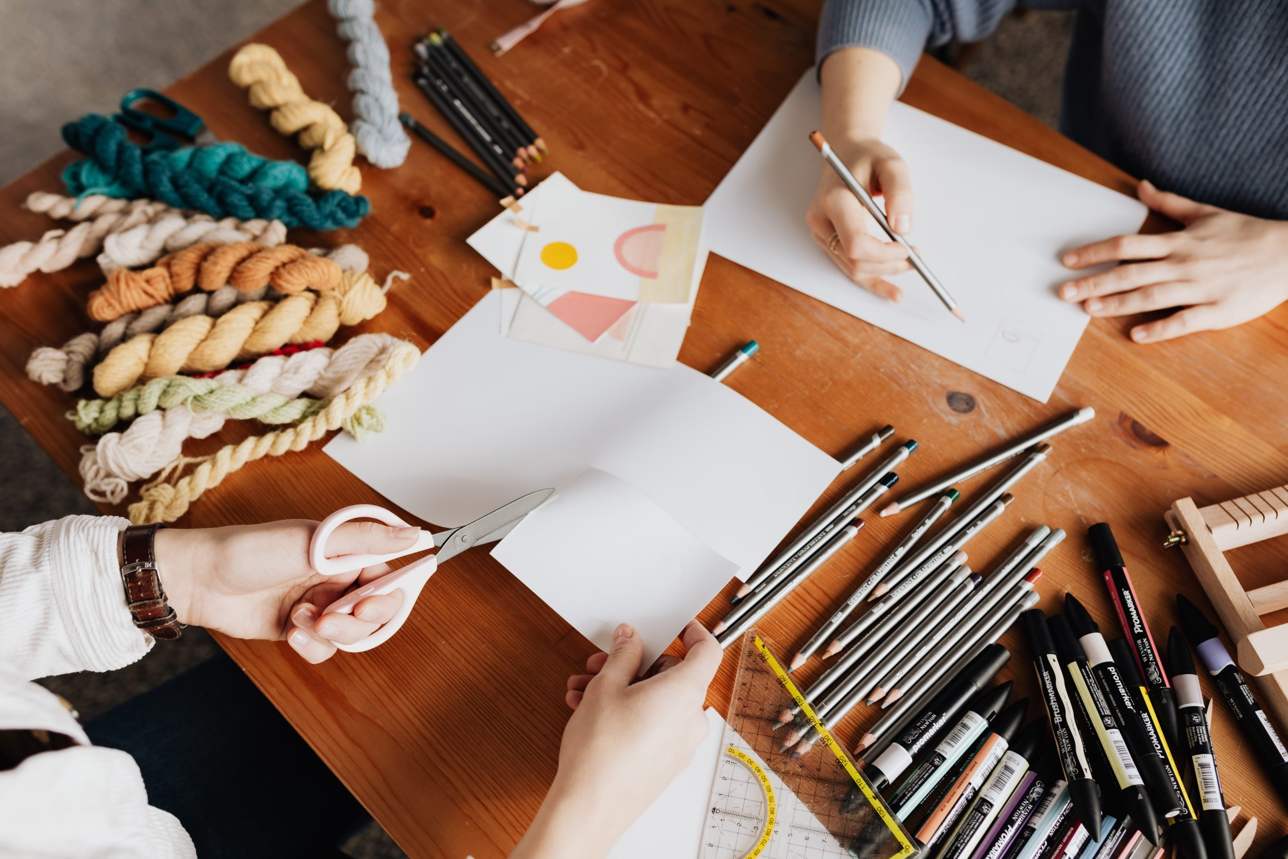 artists working at desk