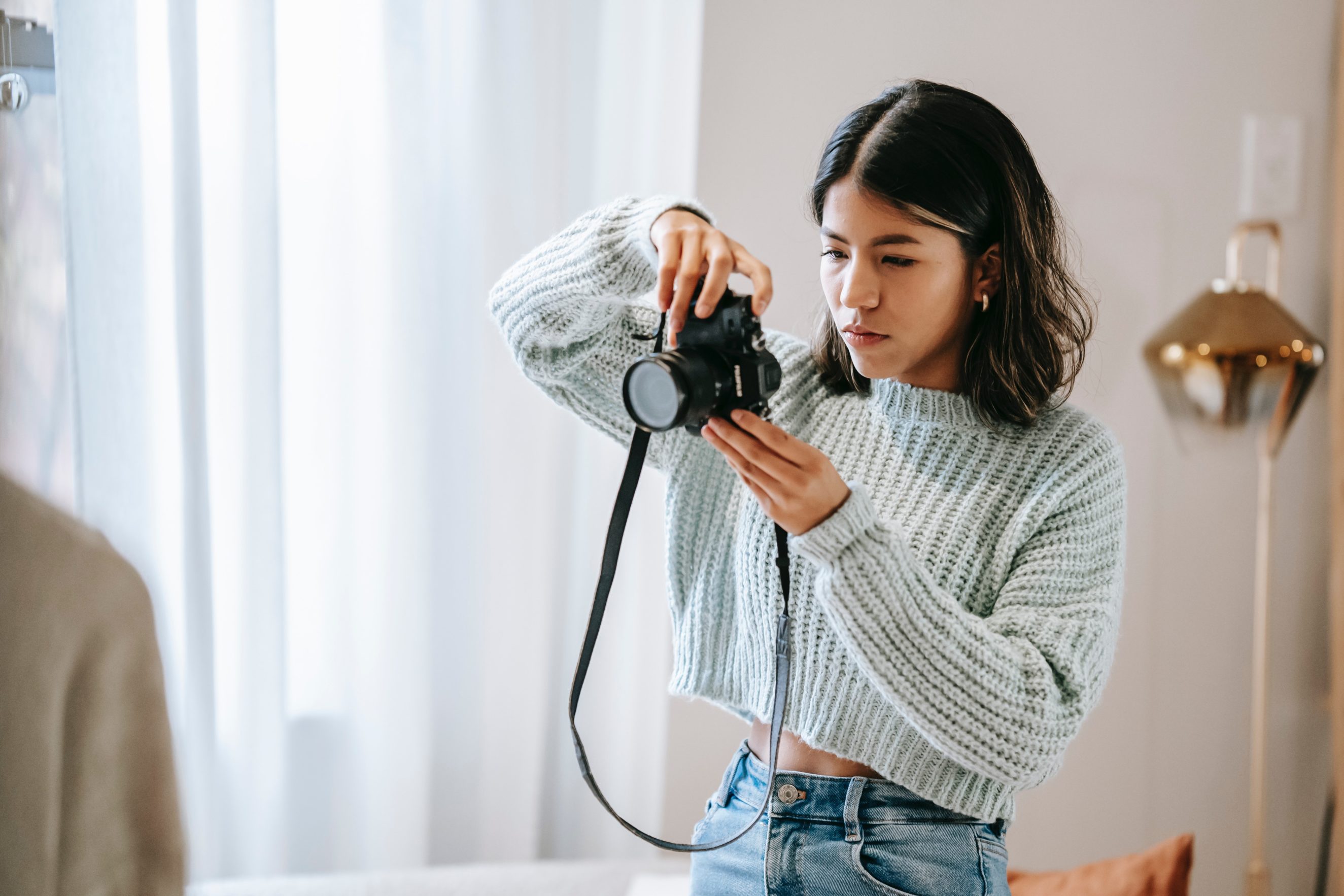 woman taking picture dslr camera