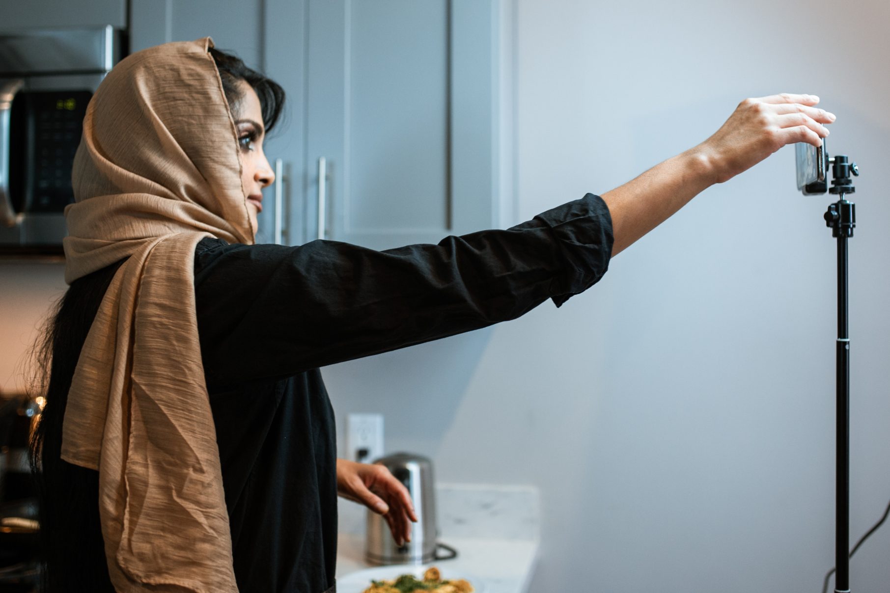 woman filming herself on phone