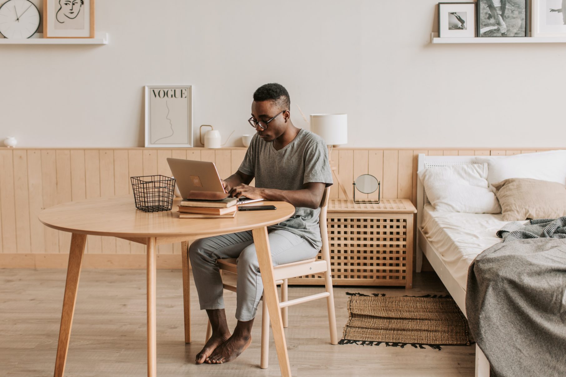 man at desk at home