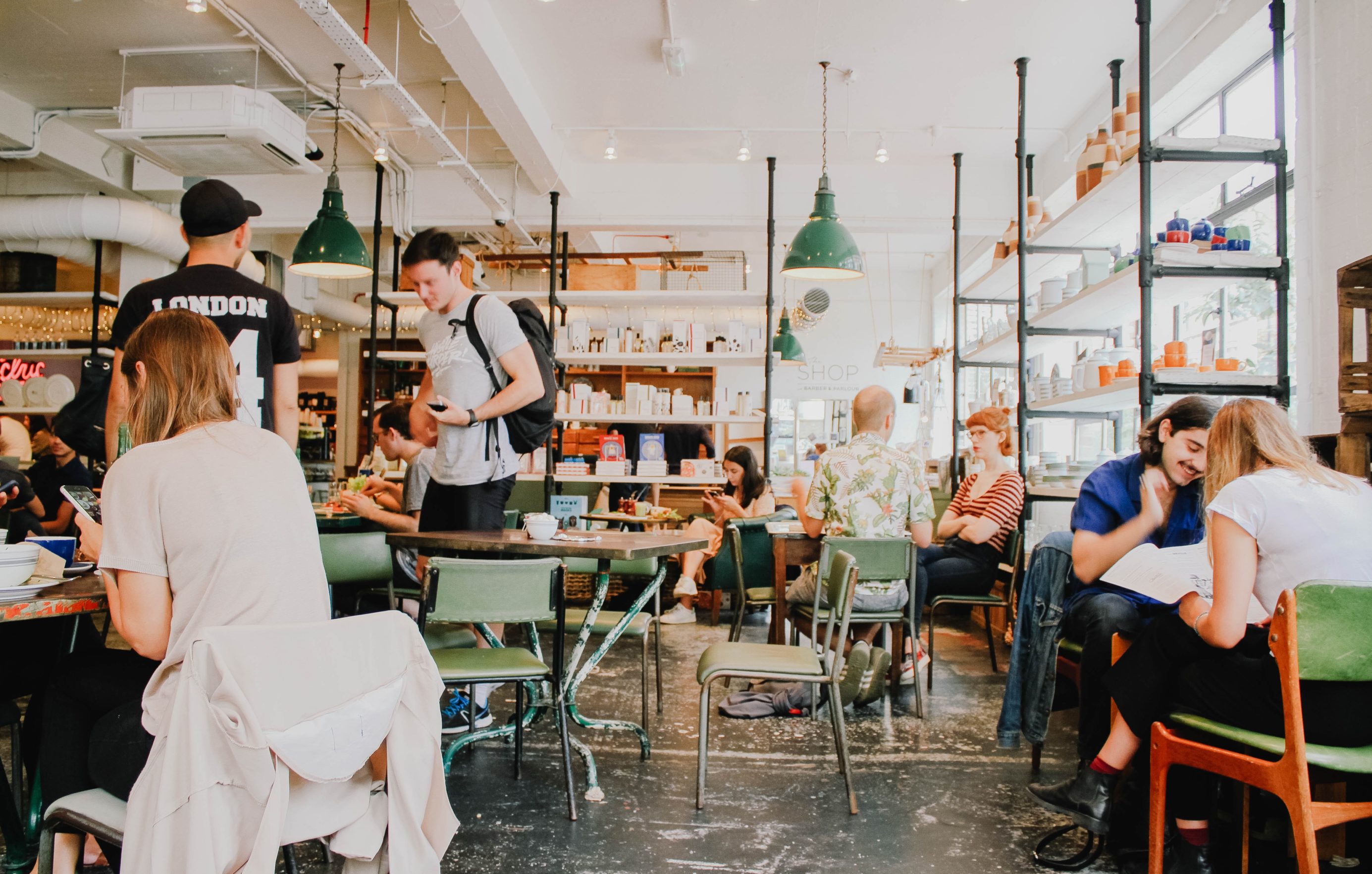 people at work in cafe