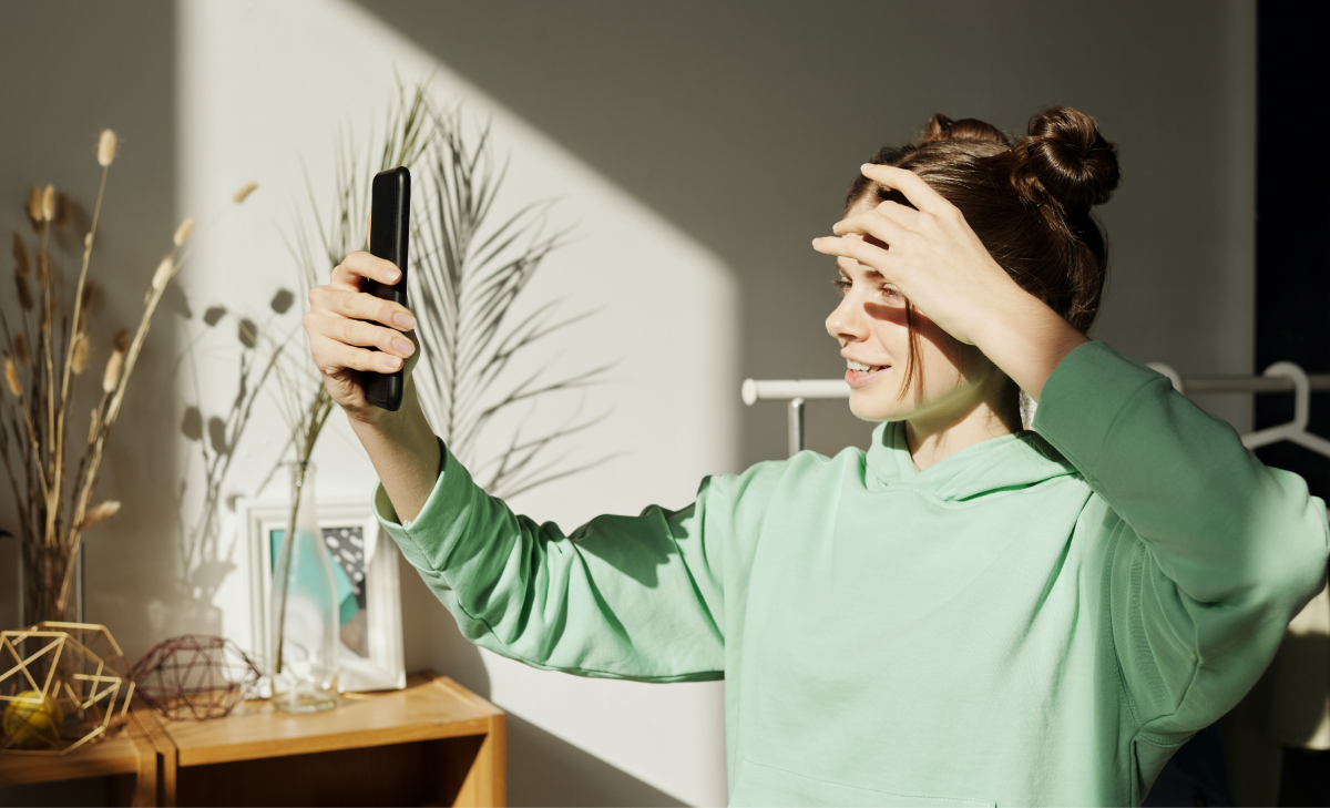 woman filming a selfie