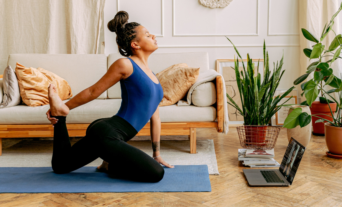 woman doing yoga at home