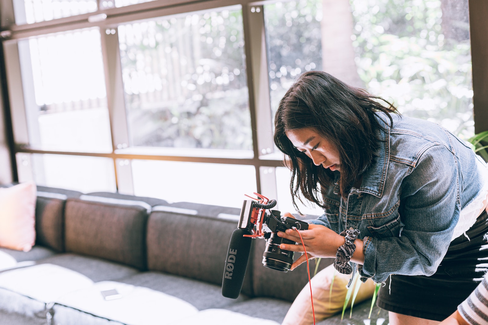 woman recording with microphone