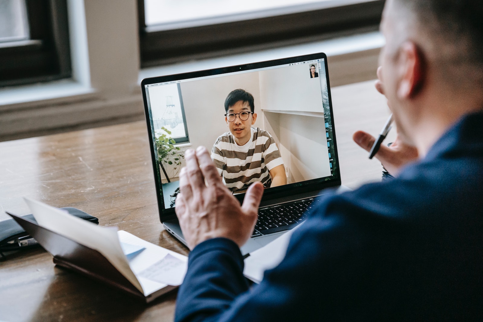 man teaching online