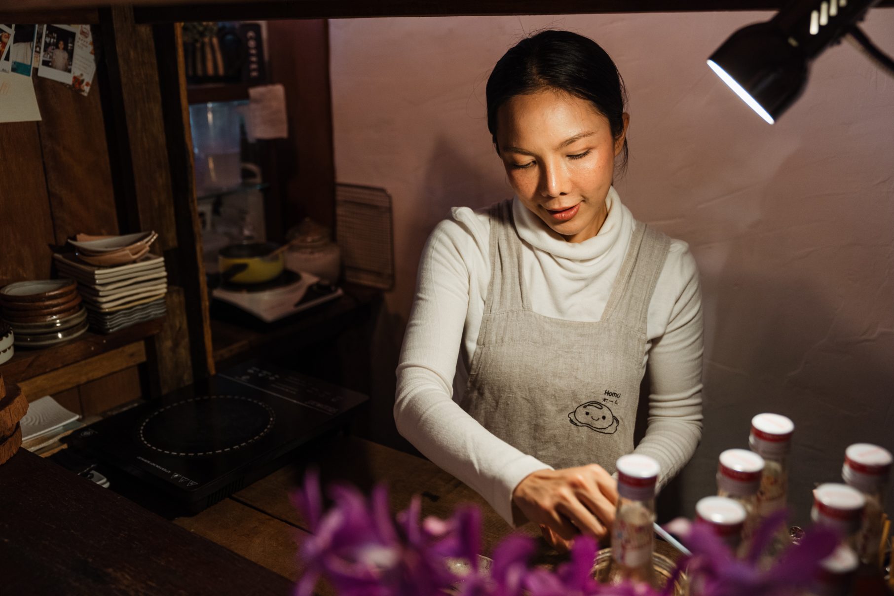 woman working in booth