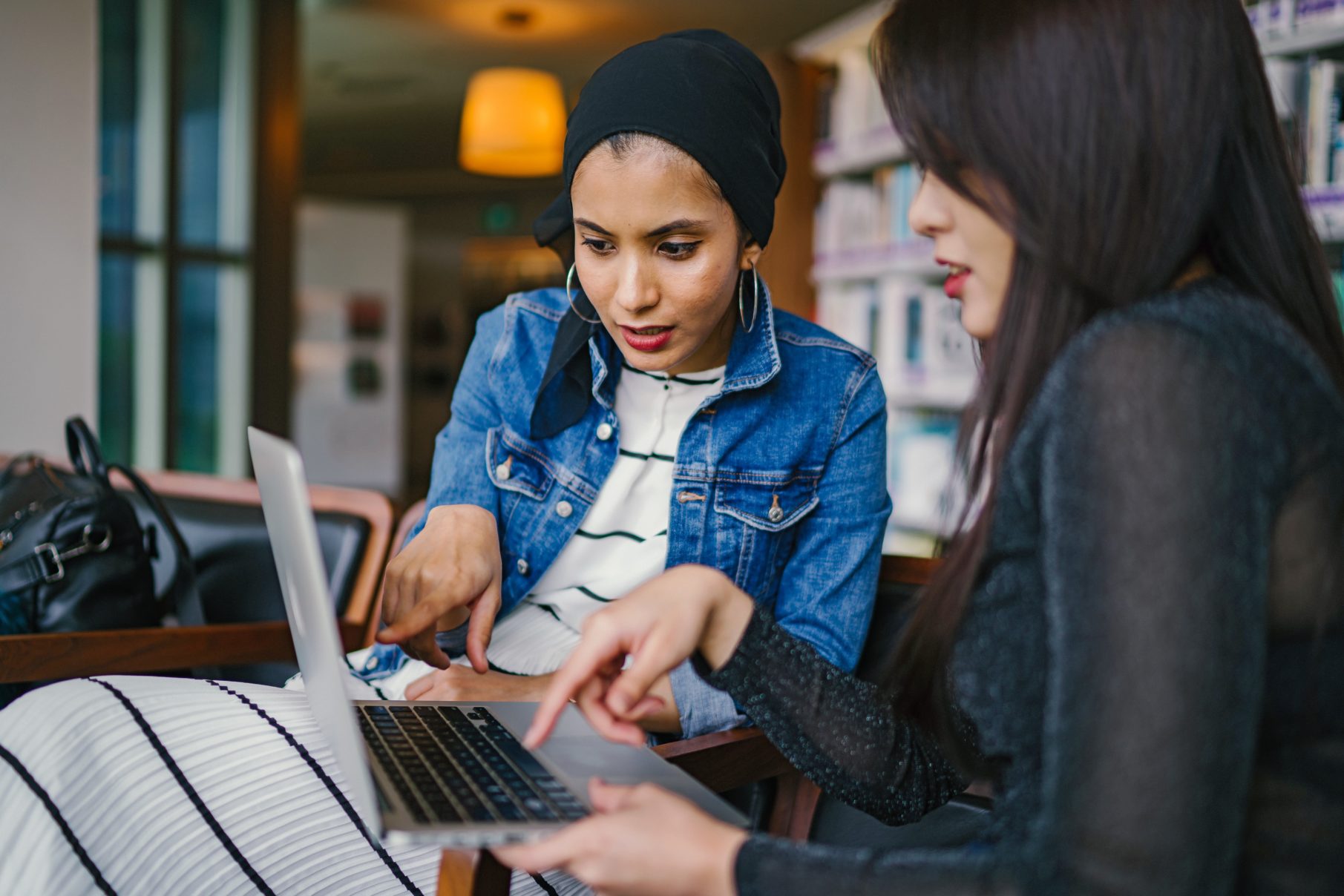 women looking at laptop