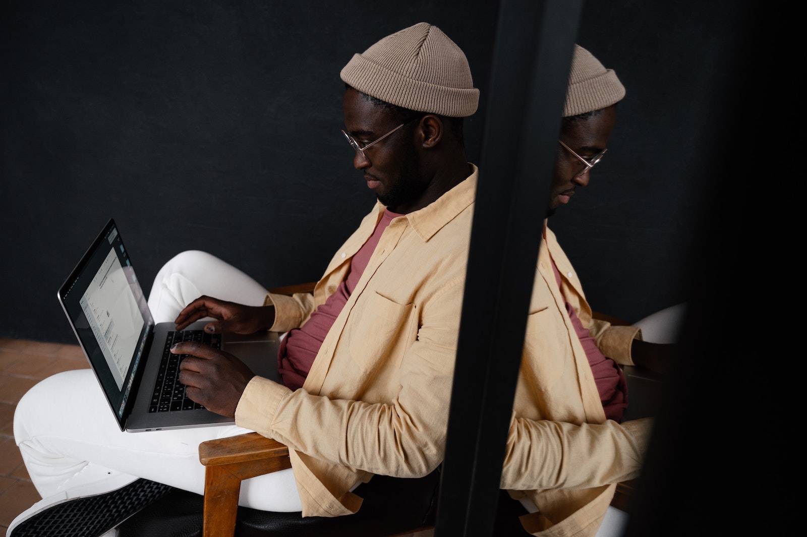 man working on laptop