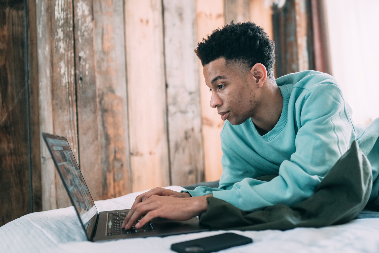 man working at laptop