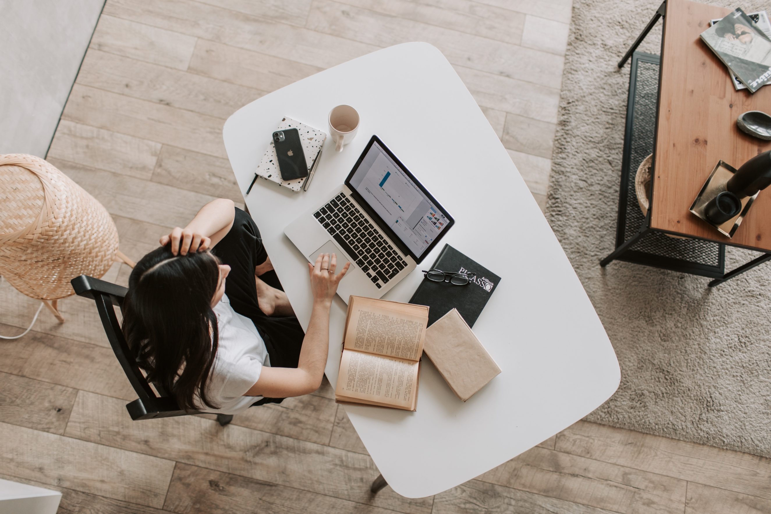 aerial view of woman working at modern desk