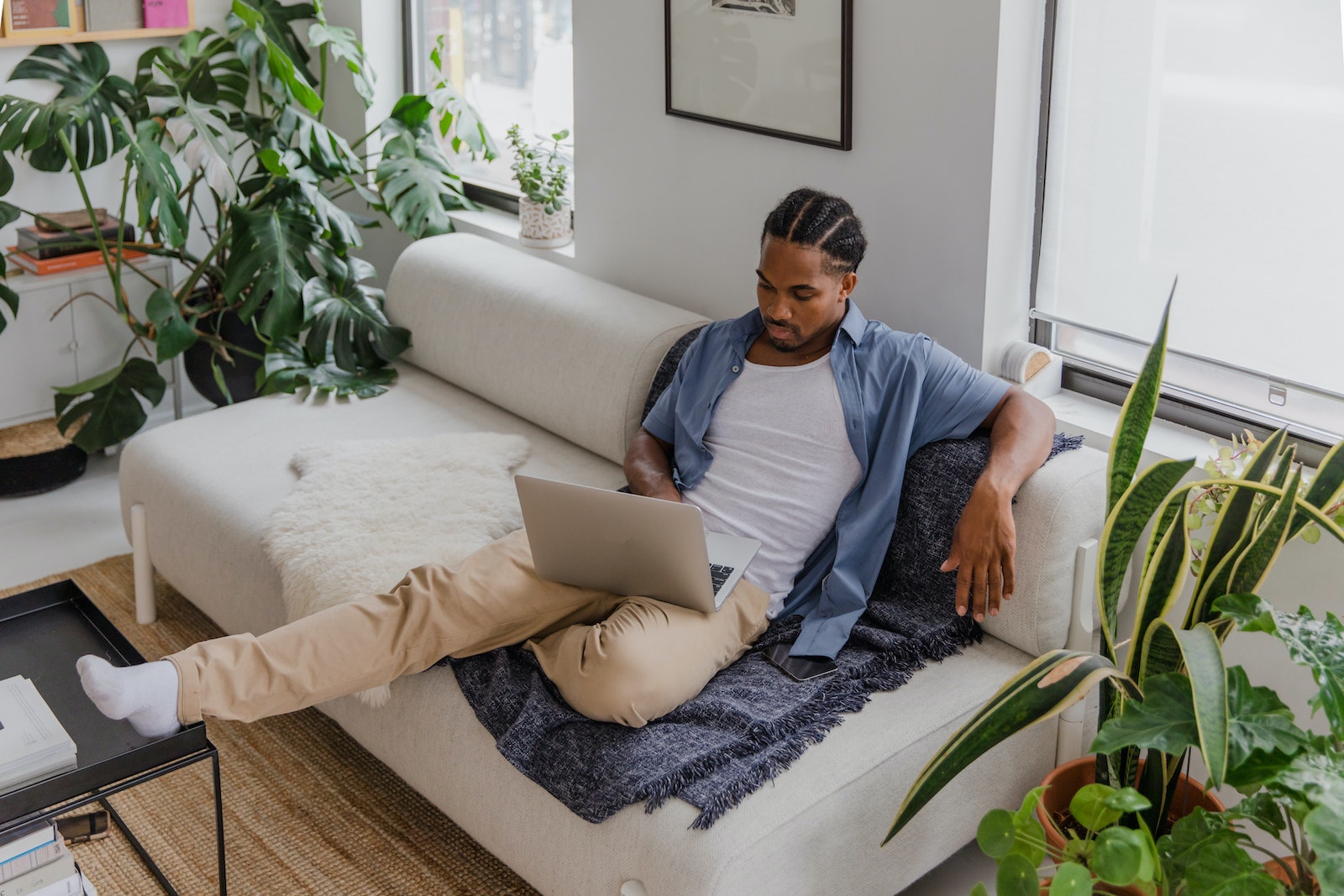 person working on laptop at home