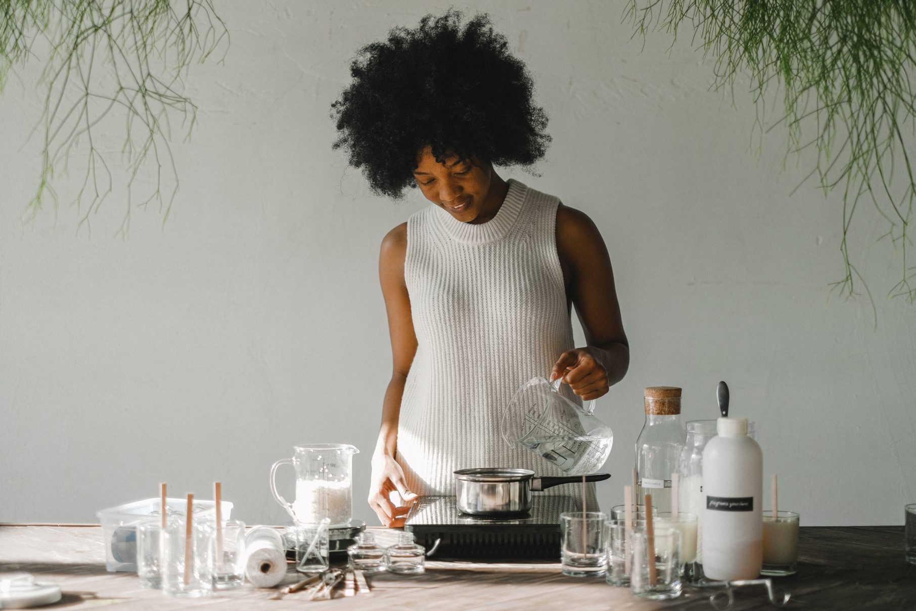 woman making candles time management