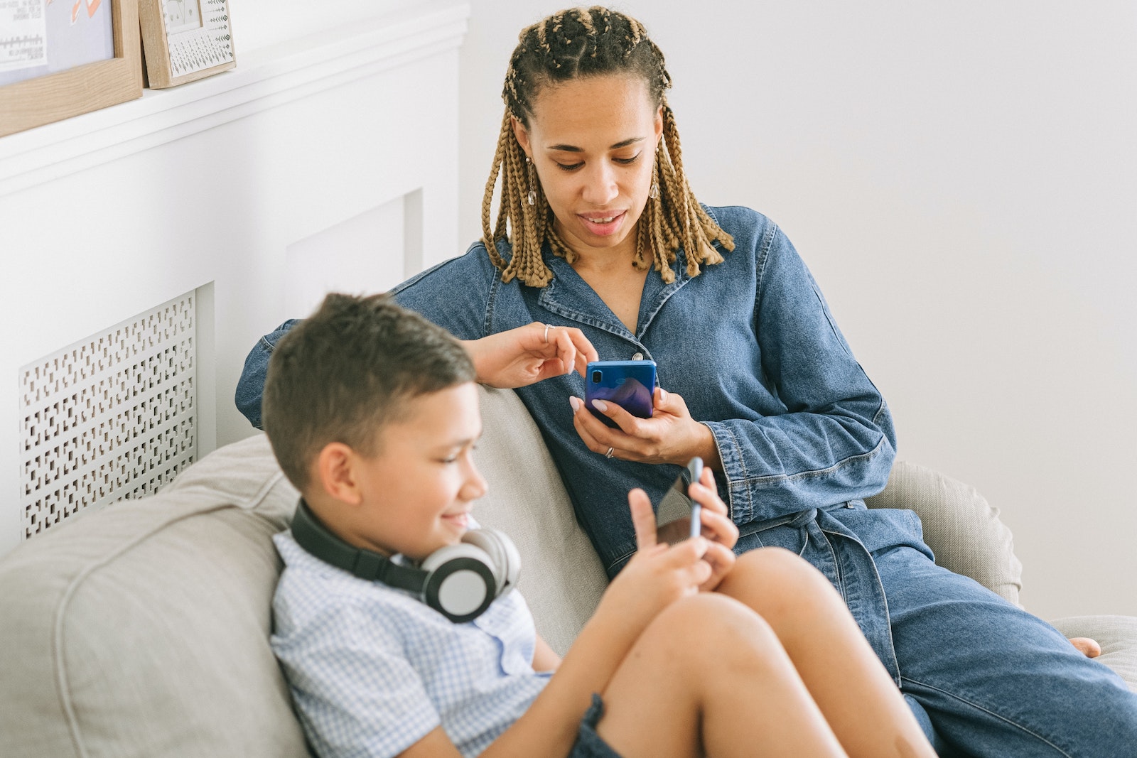 person on phone with child