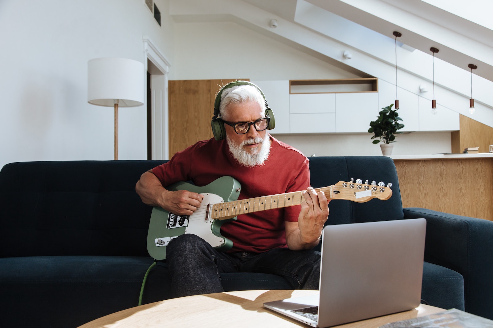 man teaching guitar