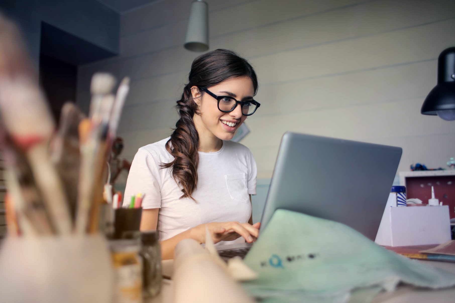 woman sitting at laptop