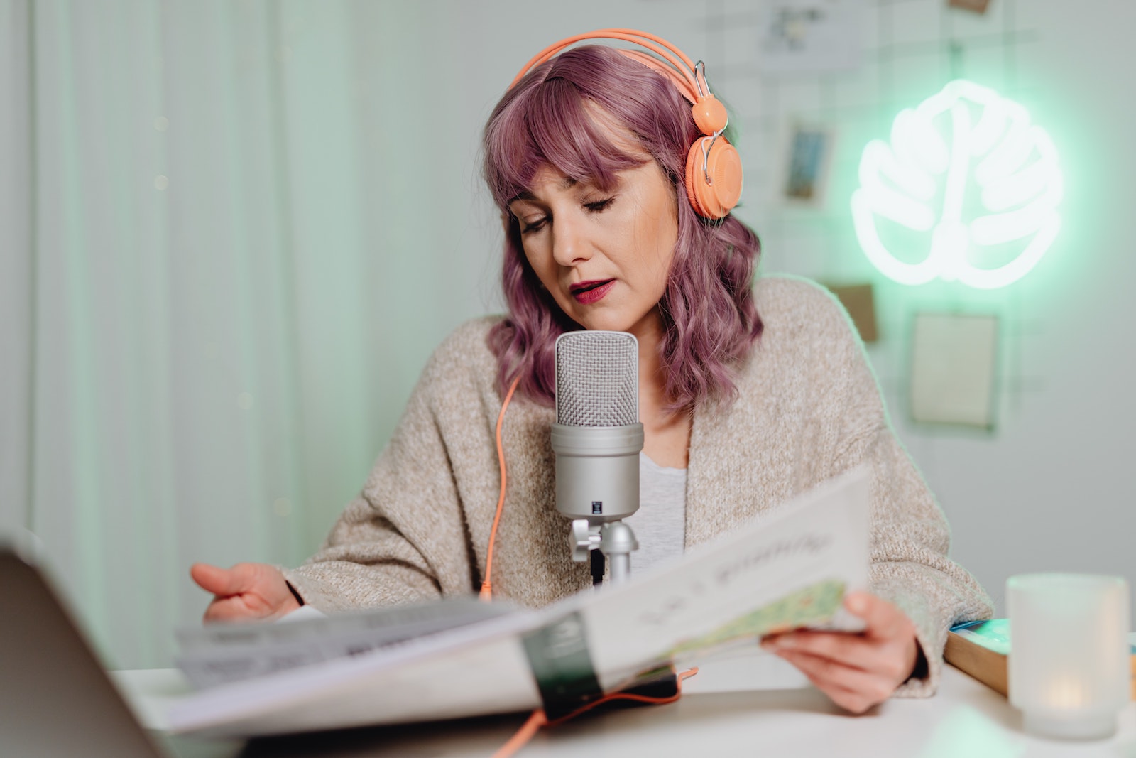 person recording with microphone