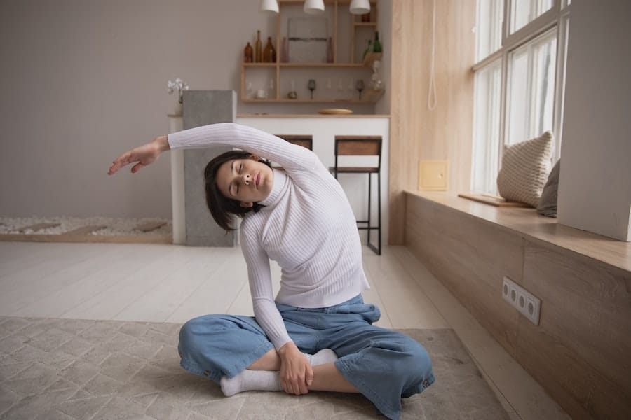 person calming nervous system with stretching